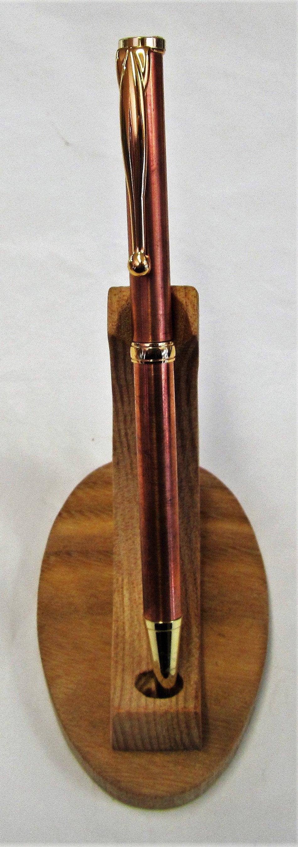 Handcrafted copper pipe pen with various fittings and pen type