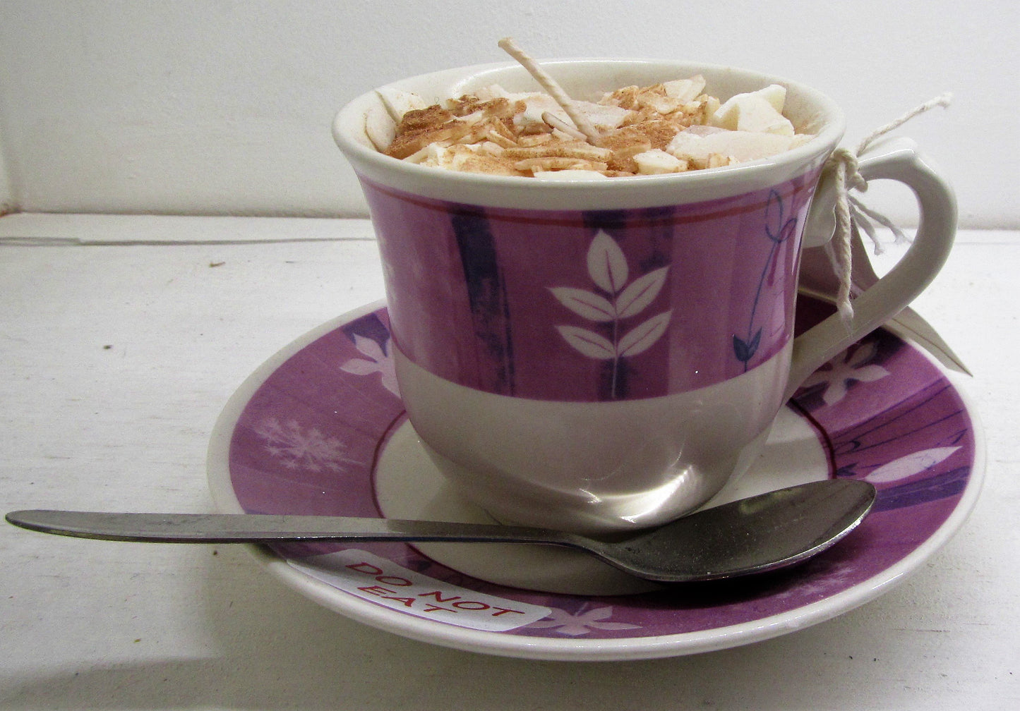 Handcrafted beautiful tea cup and saucer with candle