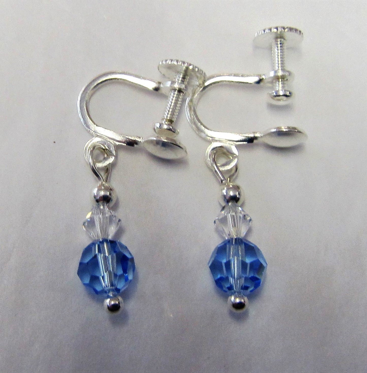 Handcrafted swarovski crystal blue screw fastening earrings
