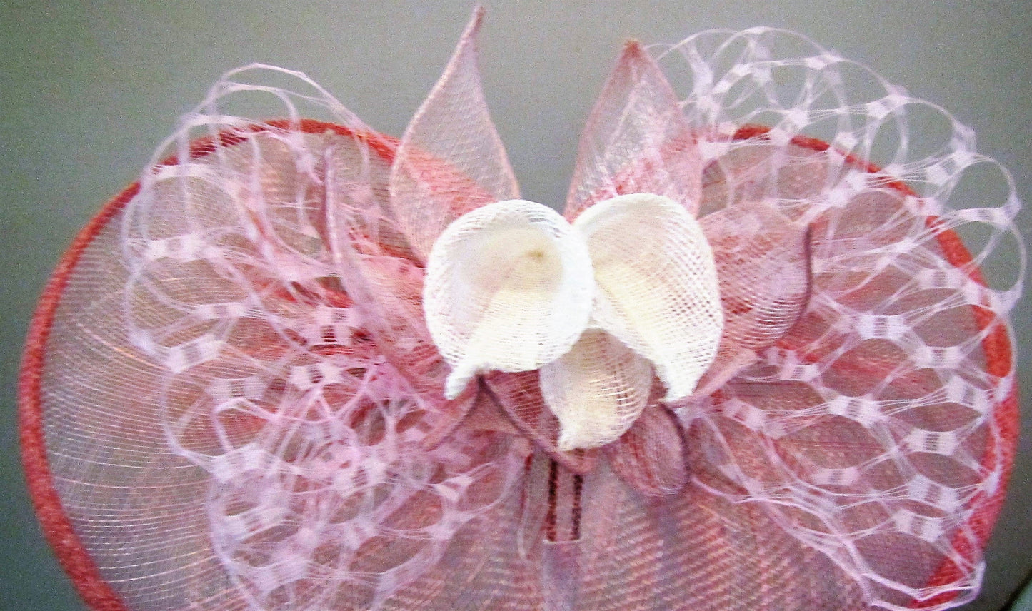Handcrafted fascinator with white lilies and leaves on a clip or headband various colours