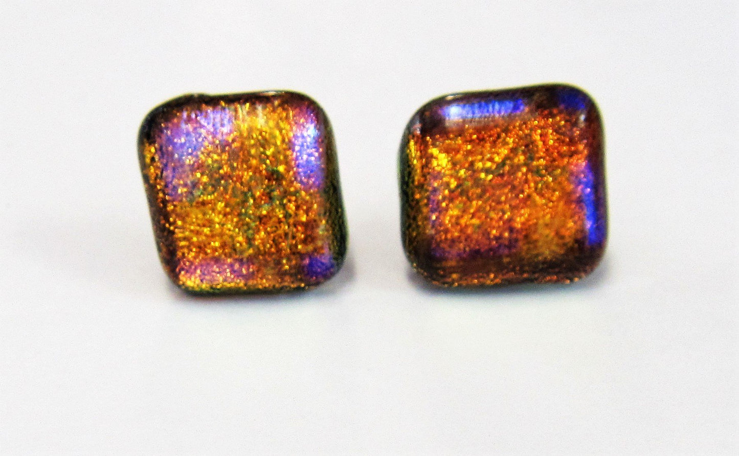 Handcrafted dichroic glass earrings on a sterling silver posts with butterflies