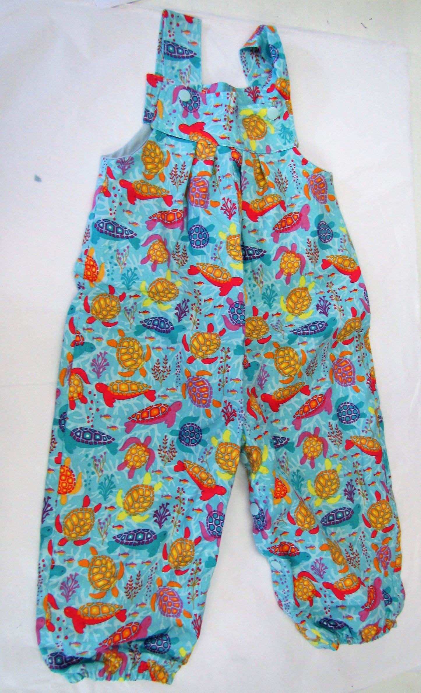 Handcrafted blue and various coloured turtle romper 12-18 months