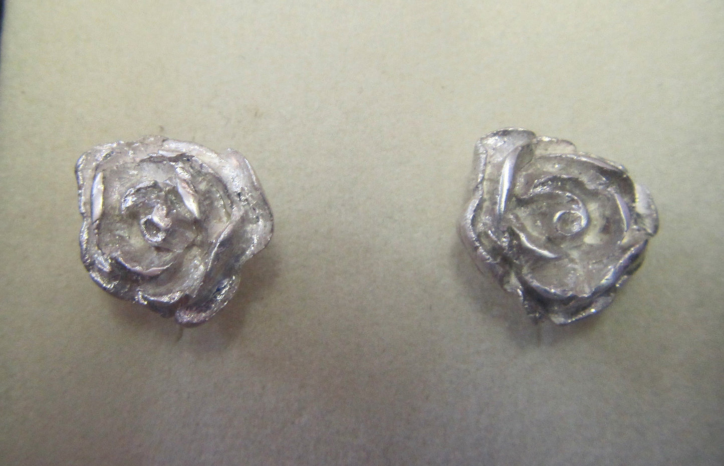 Handcrafted silver rose stud earrings on 925 posts and butterflies