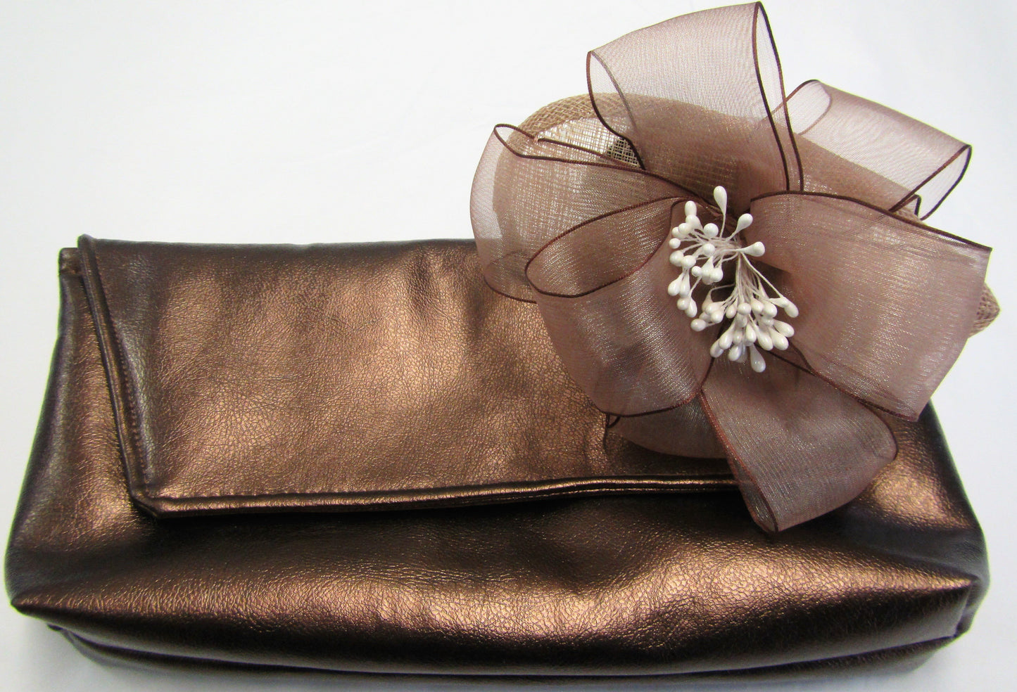 Handcrafted small beige bow fascinator on a hair band