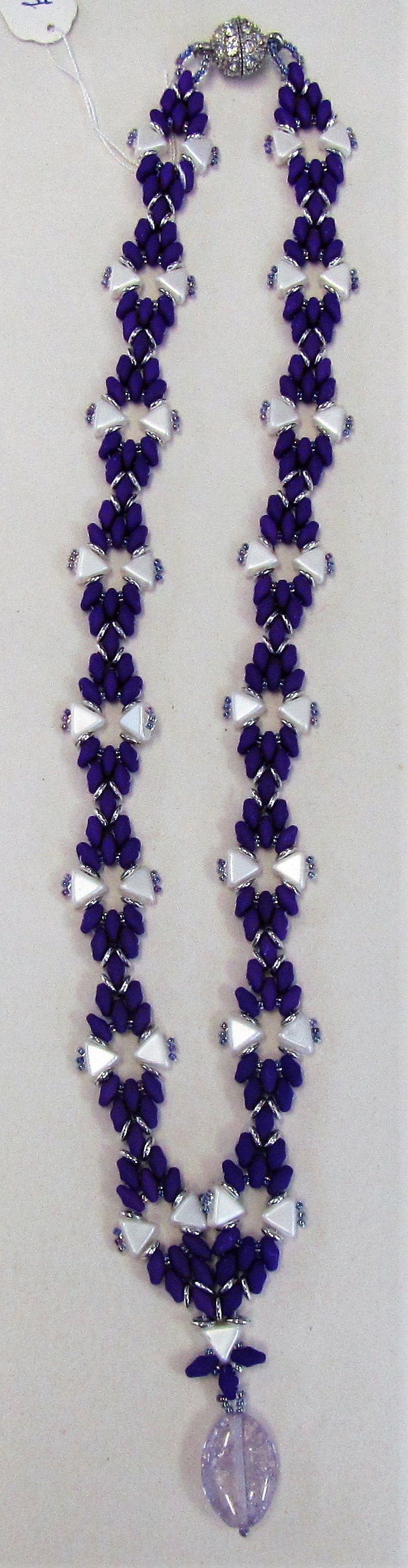 Handcrafted purple cord and white beaded necklace