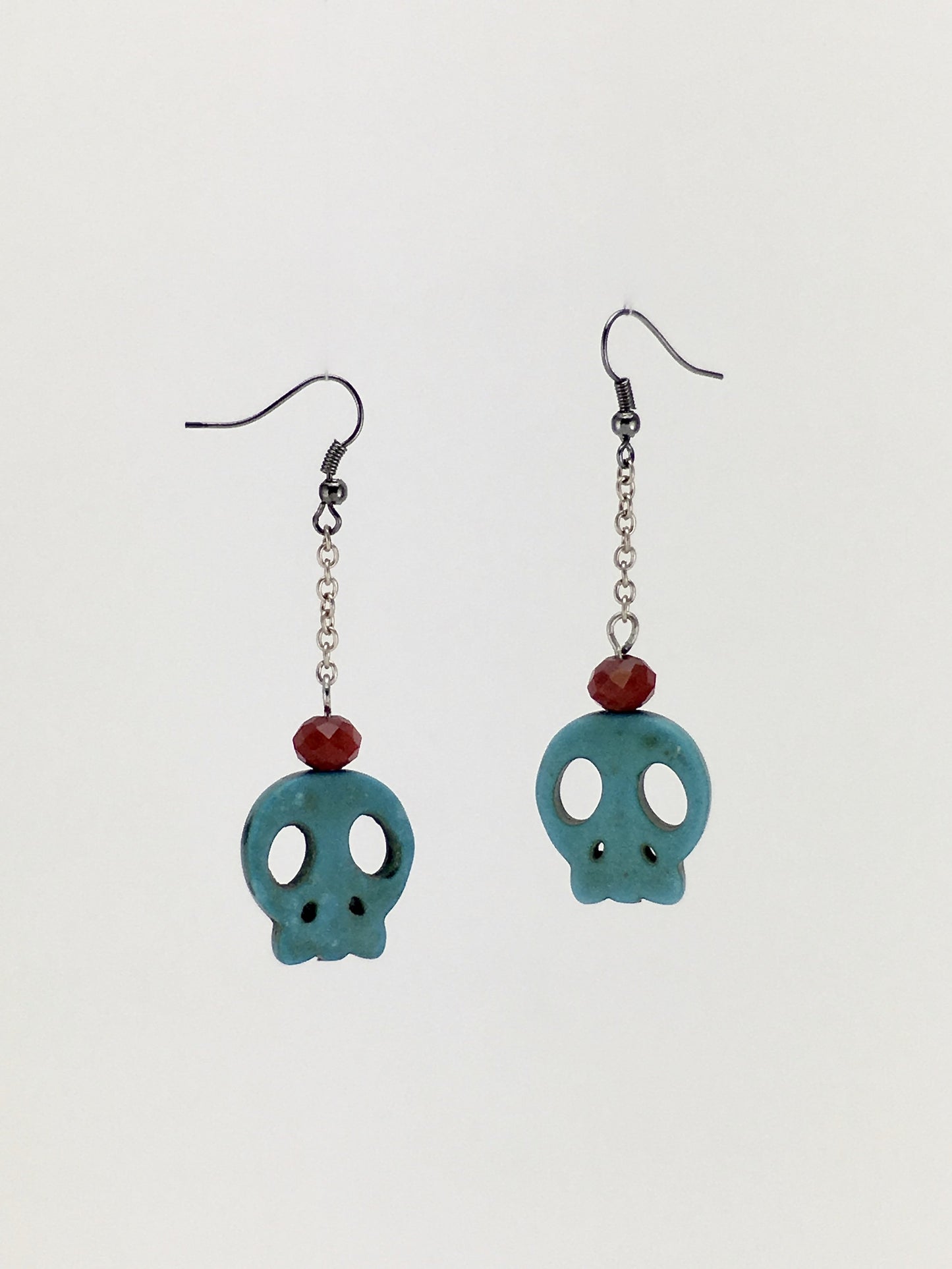 One of a kind handcrafted dangle BLUE SKULL earrings