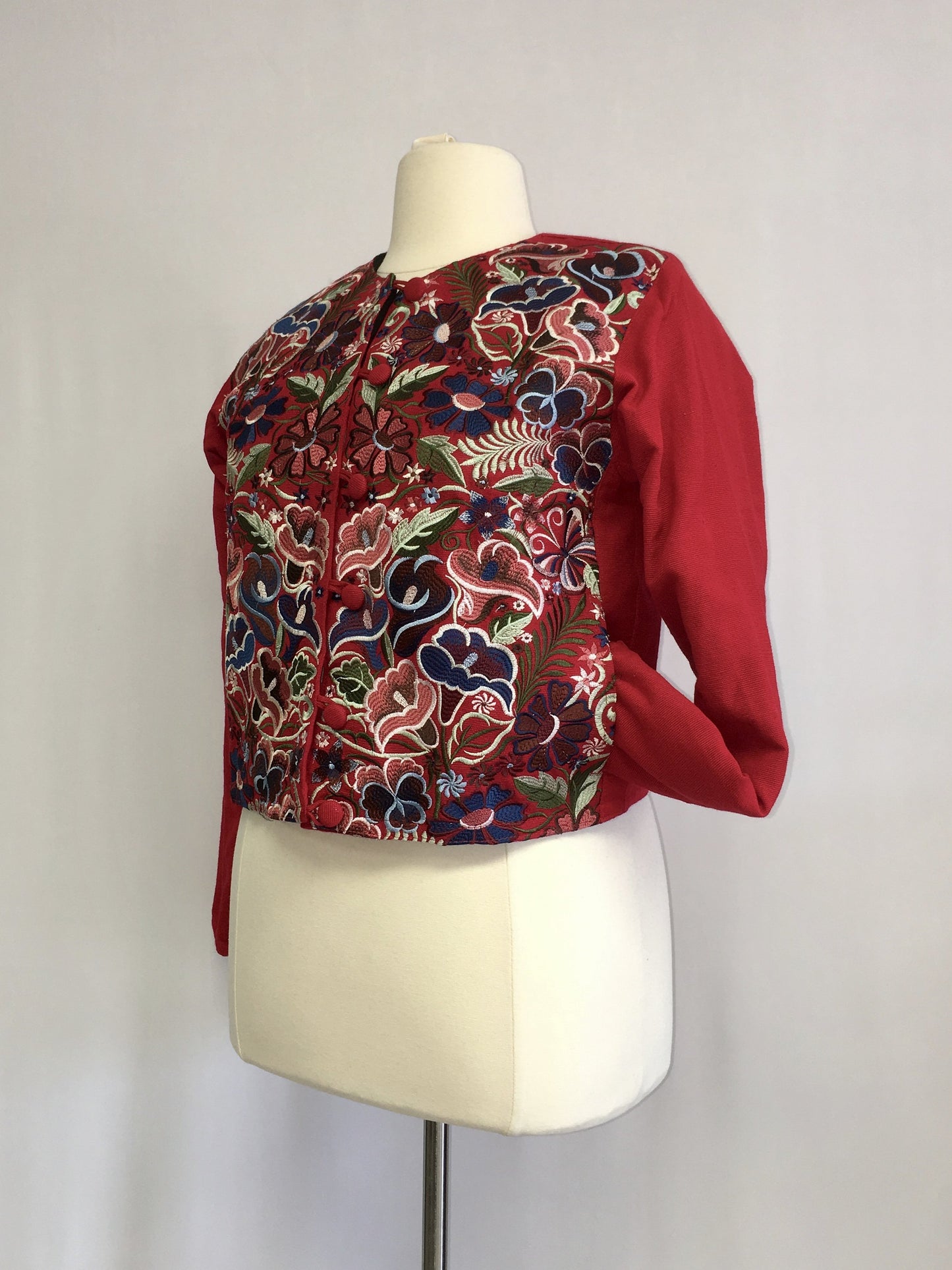 Up cycled guatemala huipil handcrafted short jacket round neck in red floral pattern 1