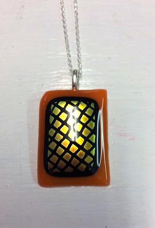 Handcrafted fused glass orange glass pendant on chain