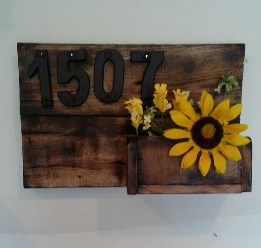 handcrafted address sign and planter