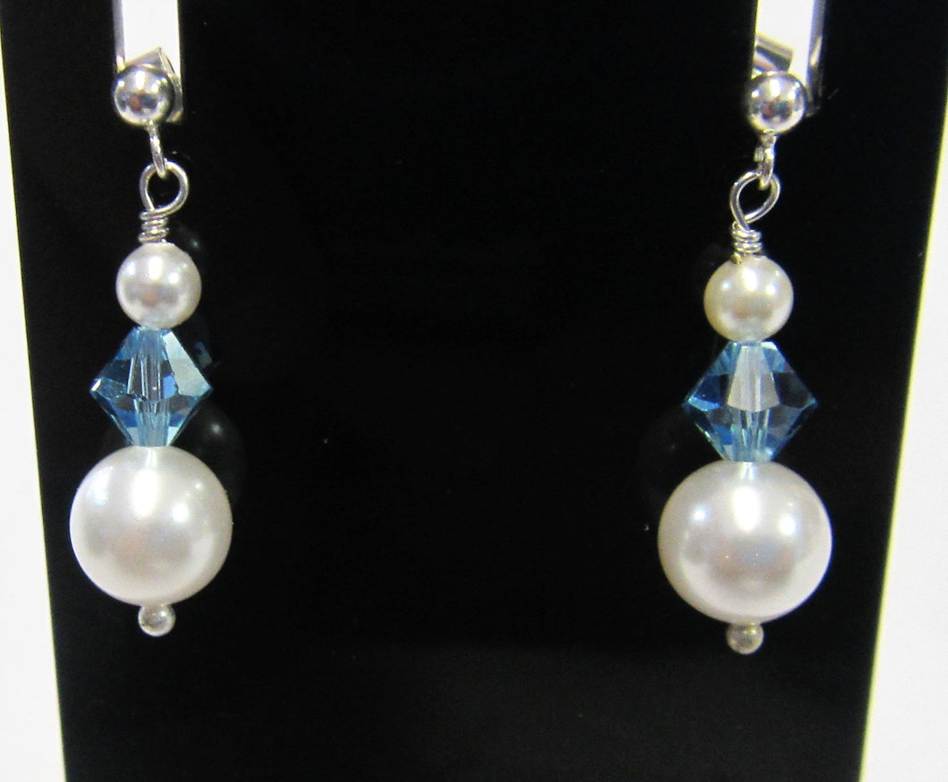 Handcrafted swarovski crystal and pearl earrings on 925 sterling silver butterflies