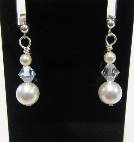 Handcrafted swarovski crystal and pearl earrings on 925 sterling silver butterflies