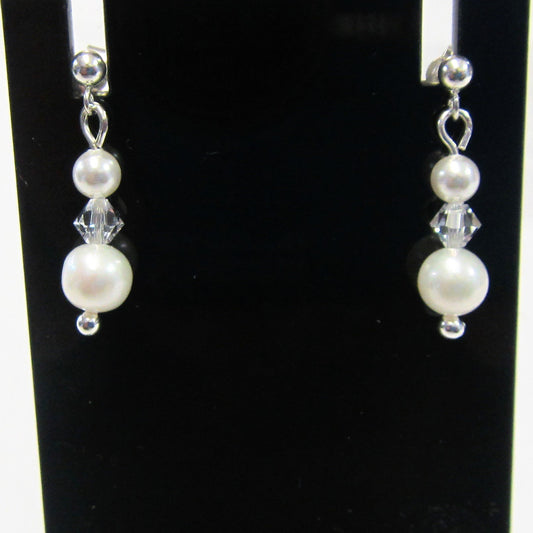 Handcrafted swarovski crystal and pearl earrings on 925 sterling silver butterflies
