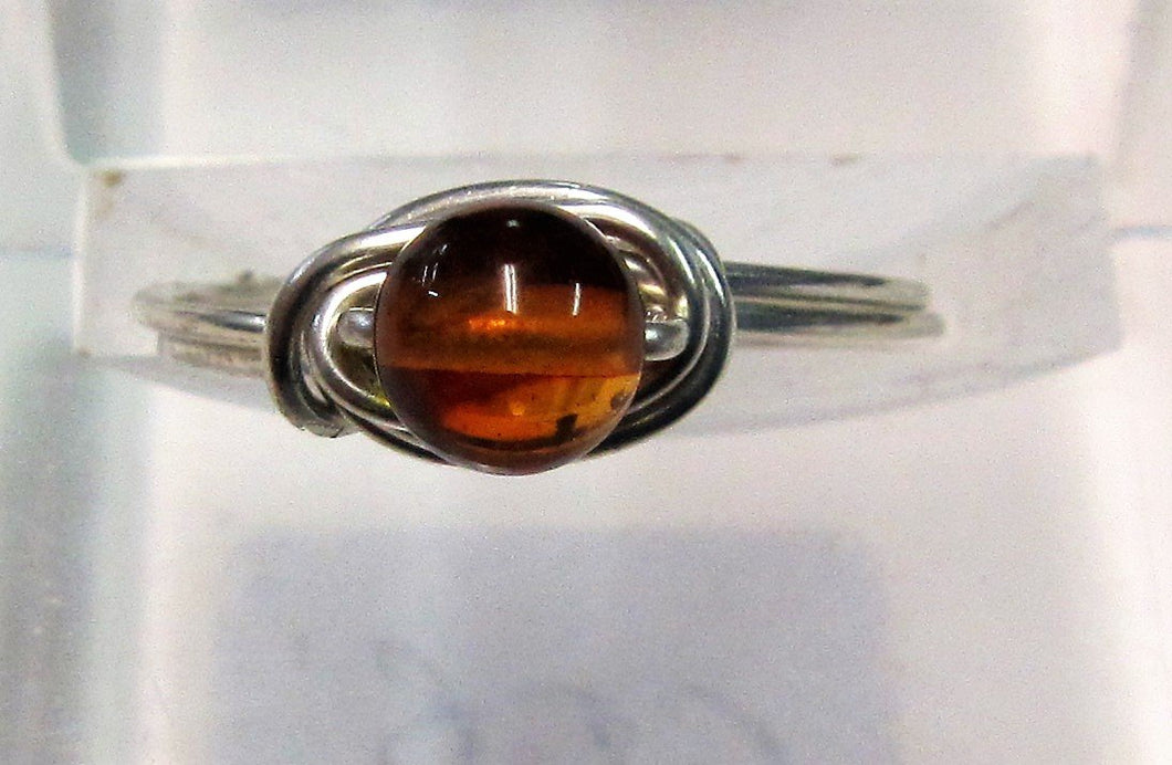 Handcrafted wire ring with amber stone Size L