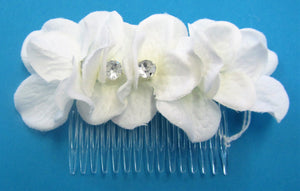 Handcrafted bridal hair piece slide with 7 flowers with diamante centres