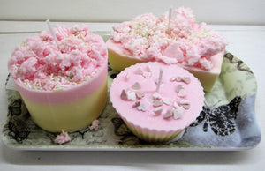 Handcrafted beautiful cake candles on a tray