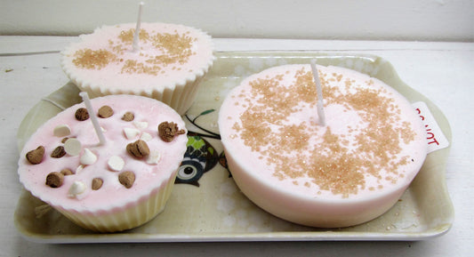 Handcrafted beautiful cake candles on a tray
