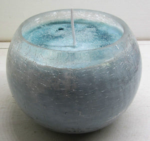 Handcrafted beautiful clear glass pot with blue candle
