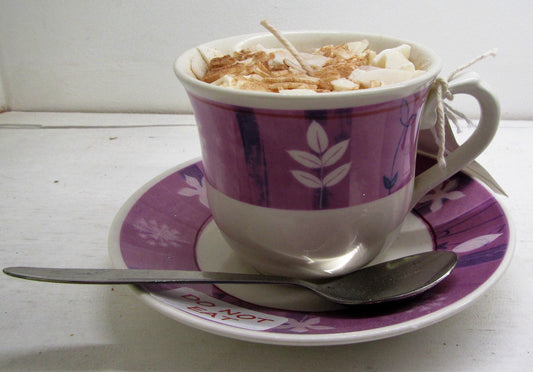 Handcrafted beautiful tea cup and saucer with candle