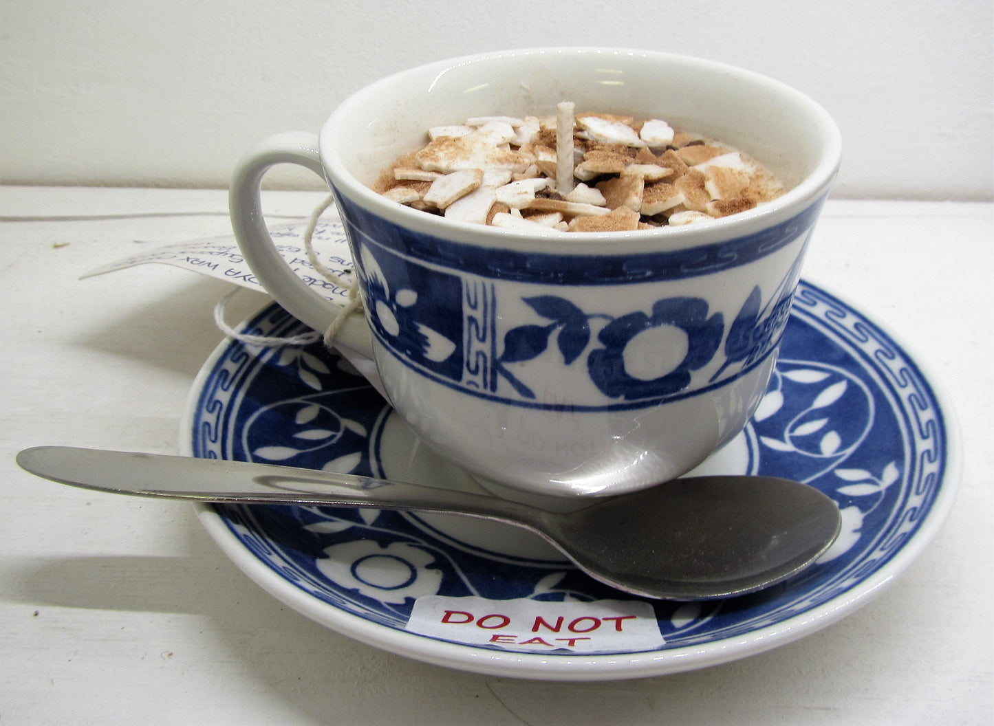 Handcrafted beautiful tea cup and saucer with candle