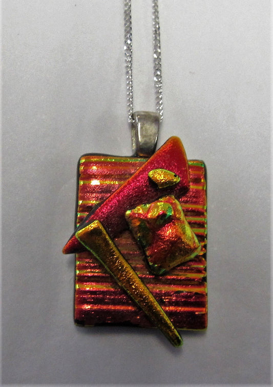 Handcrafted dichroic glass pendant on a sterling silver necklace
