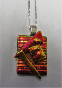 Handcrafted dichroic glass pendant on a sterling silver necklace