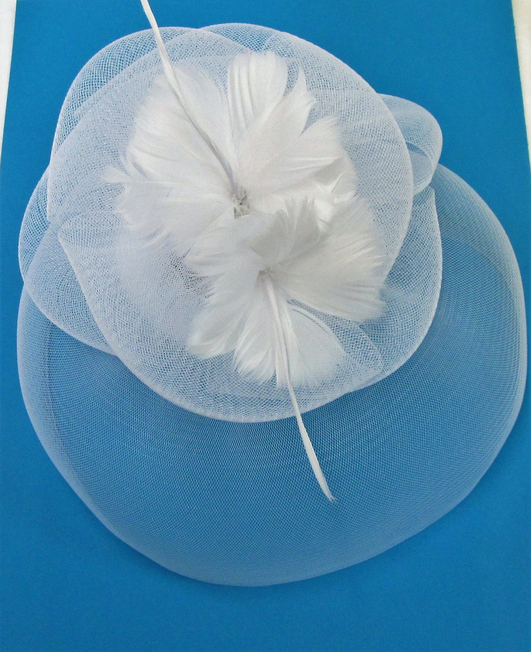 Handcrafted white bridal crinoline fascinator with two flower feathers on a hair band