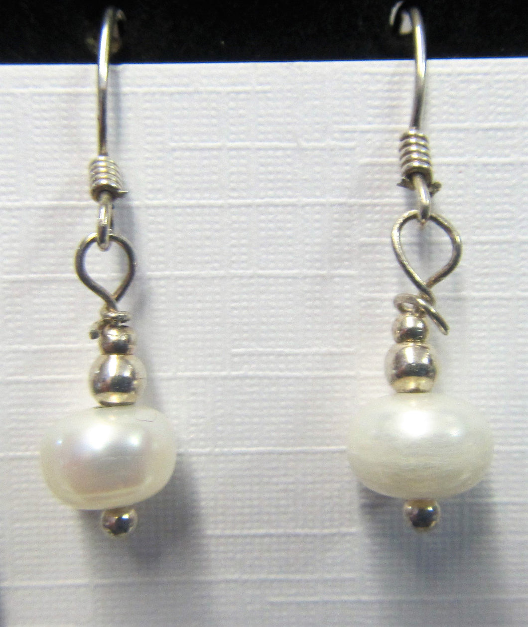 Handcrafted sterling silver pearl earrings on Sterling silver hooks