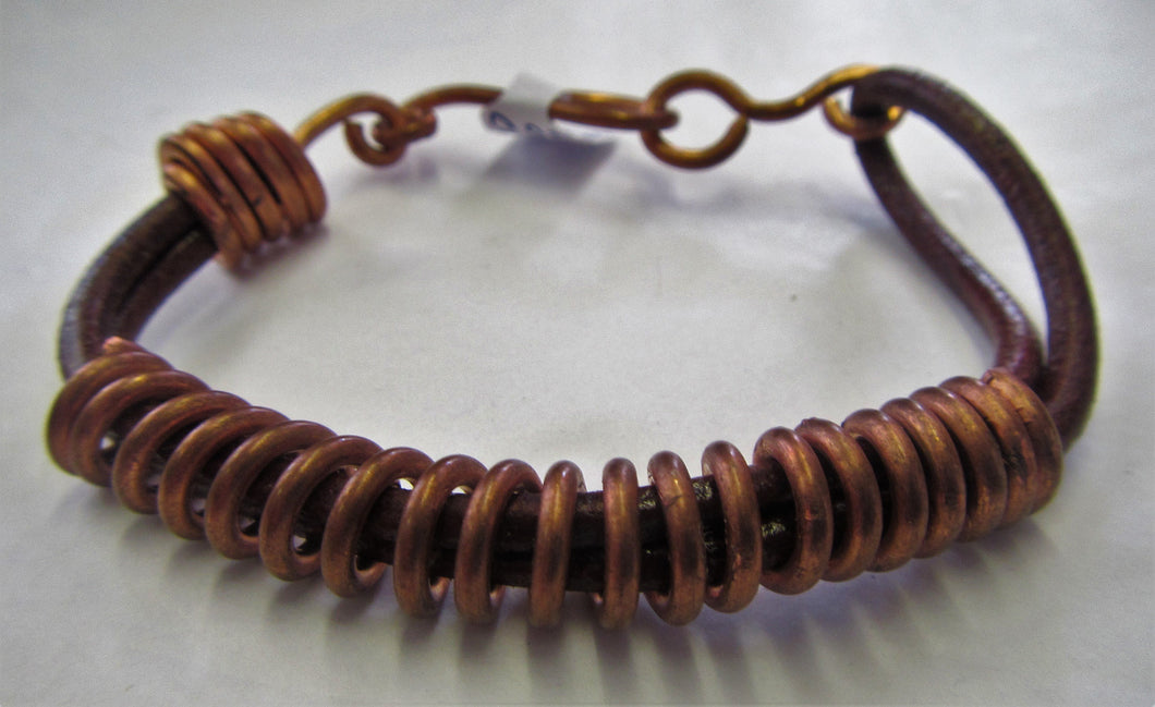 Handcrafted leather and copper twist bracelet