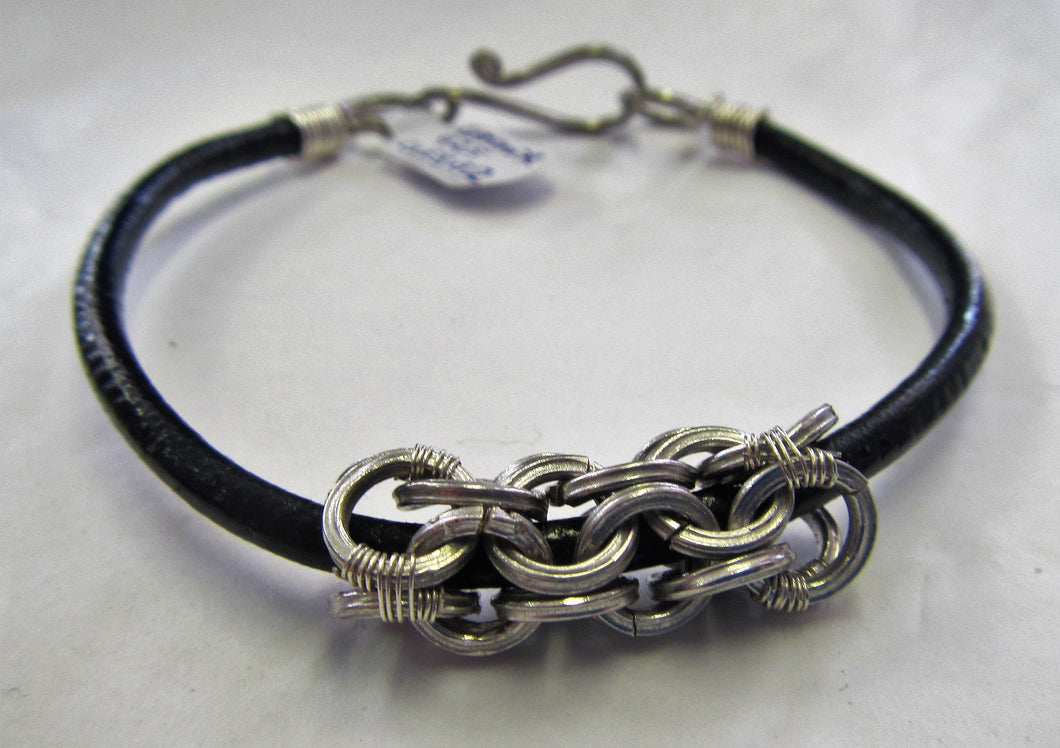 Handcrafted sterling silver and leather chainmaille bracelet