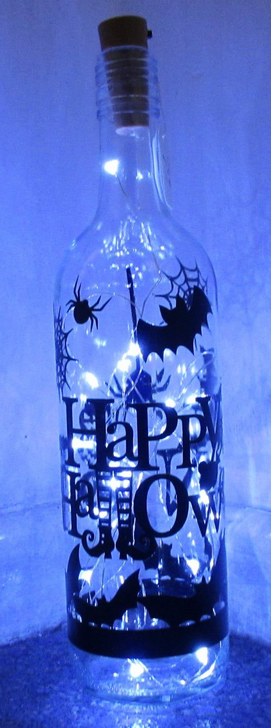 Unique handcrafted Happy Halloween light up bottle with Spiders, pumpkins and bats