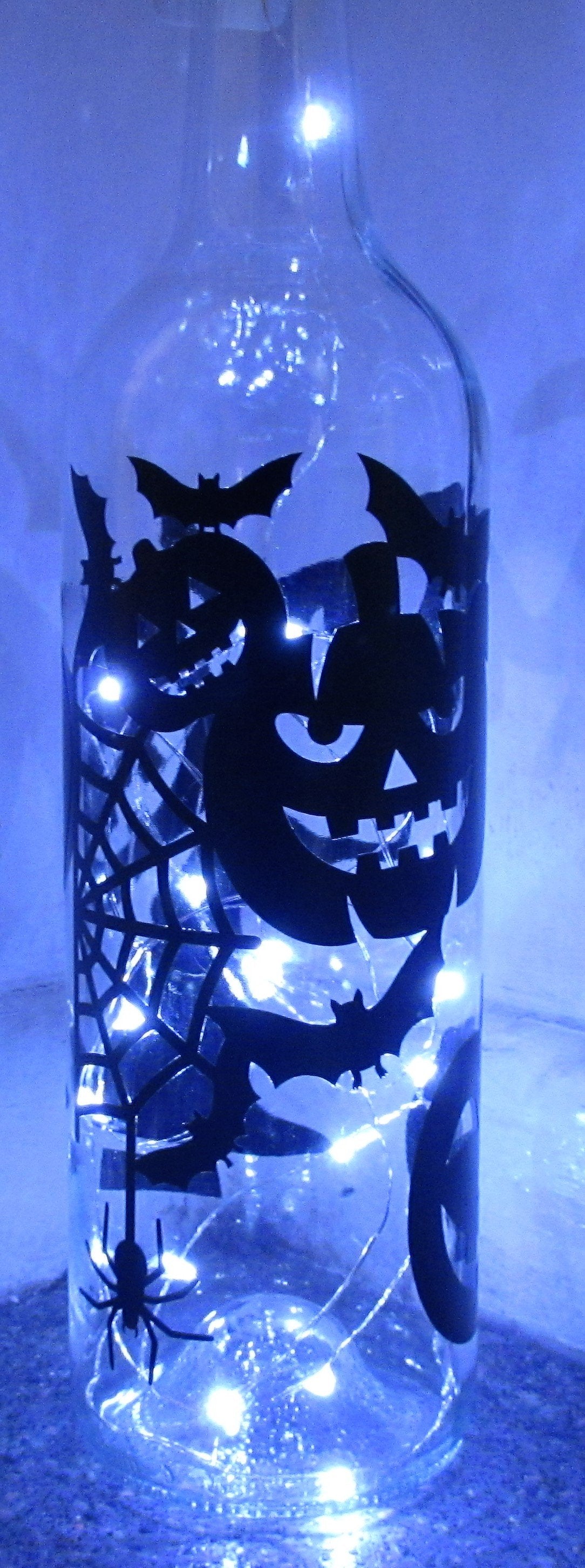 Unique handcrafted Happy Halloween light up bottle with bats and Pumpkins spiders and witches hats