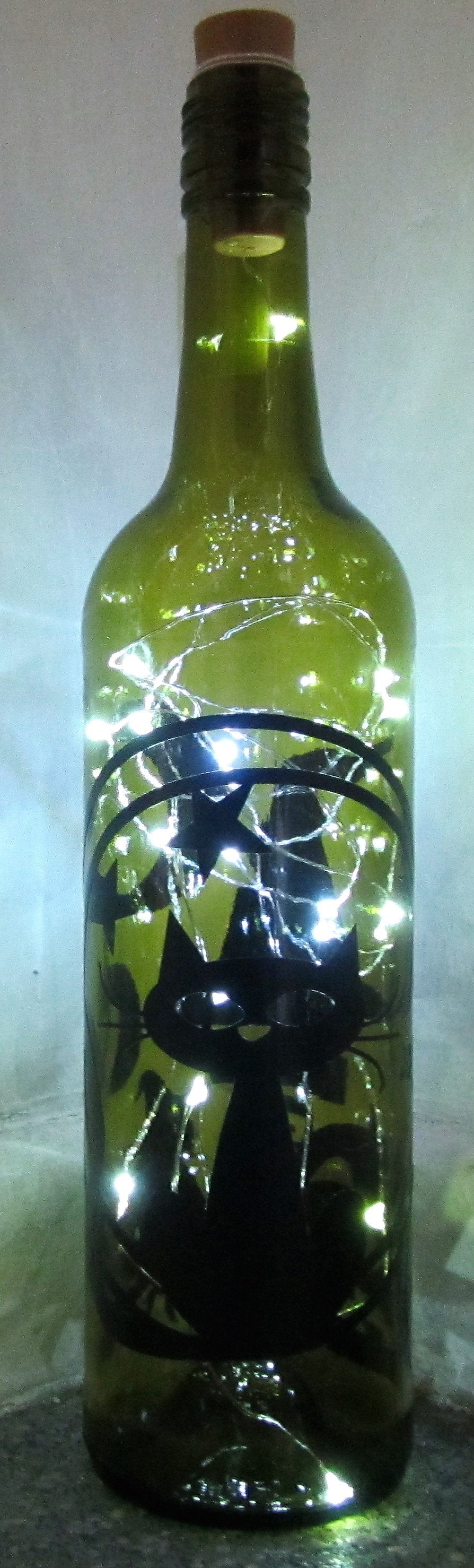 Unique handcrafted Happy Halloween light up bottle with bats and Pumpkins spiders and witches hats