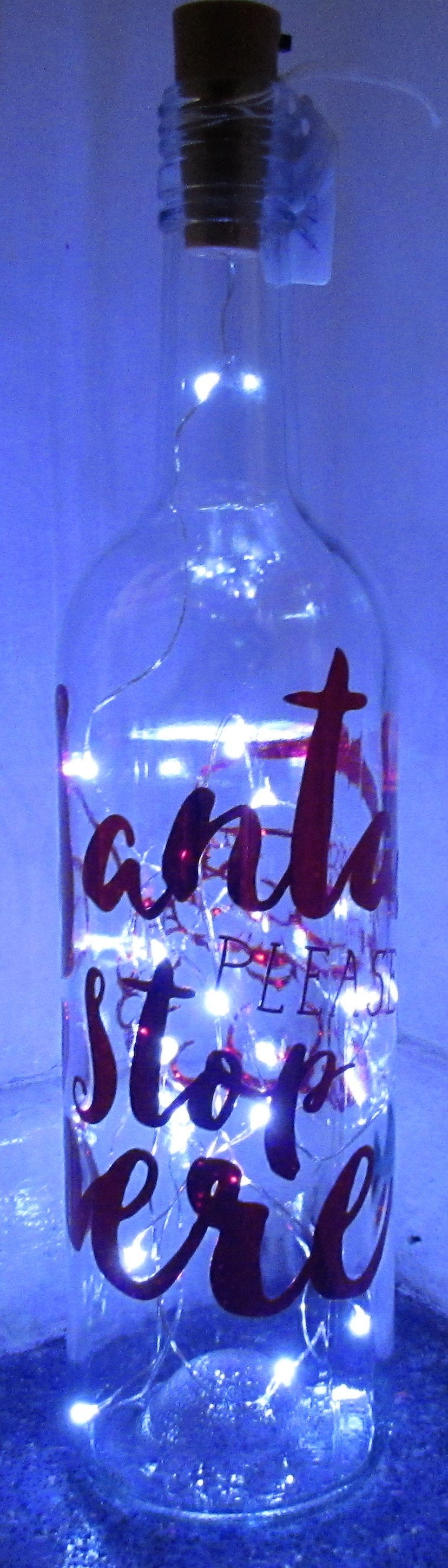 Unique handcrafted "Santa please stop here" light up bottle