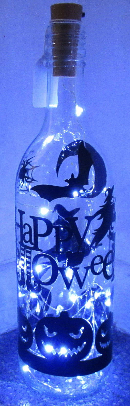 Unique handcrafted Happy Halloween light up bottle with Pumpkins and Witches