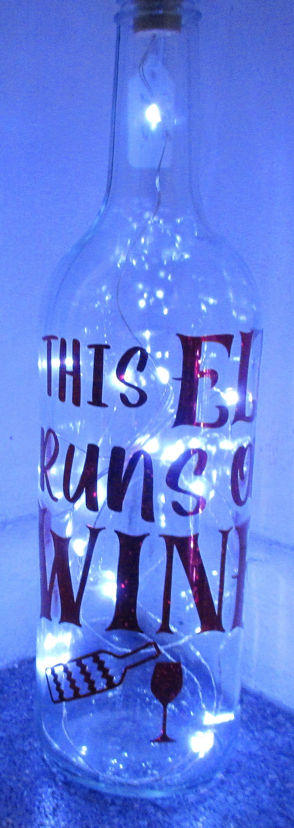 Unique handcrafted "This Elf runs on wine" light up bottle