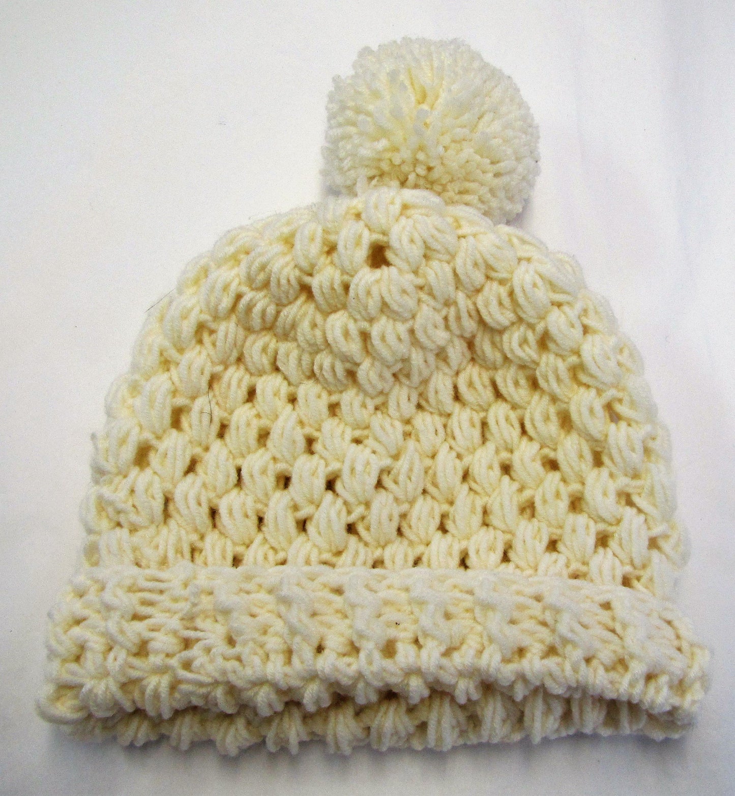 Handcrafted crochet bobble hats in various colours and sizes