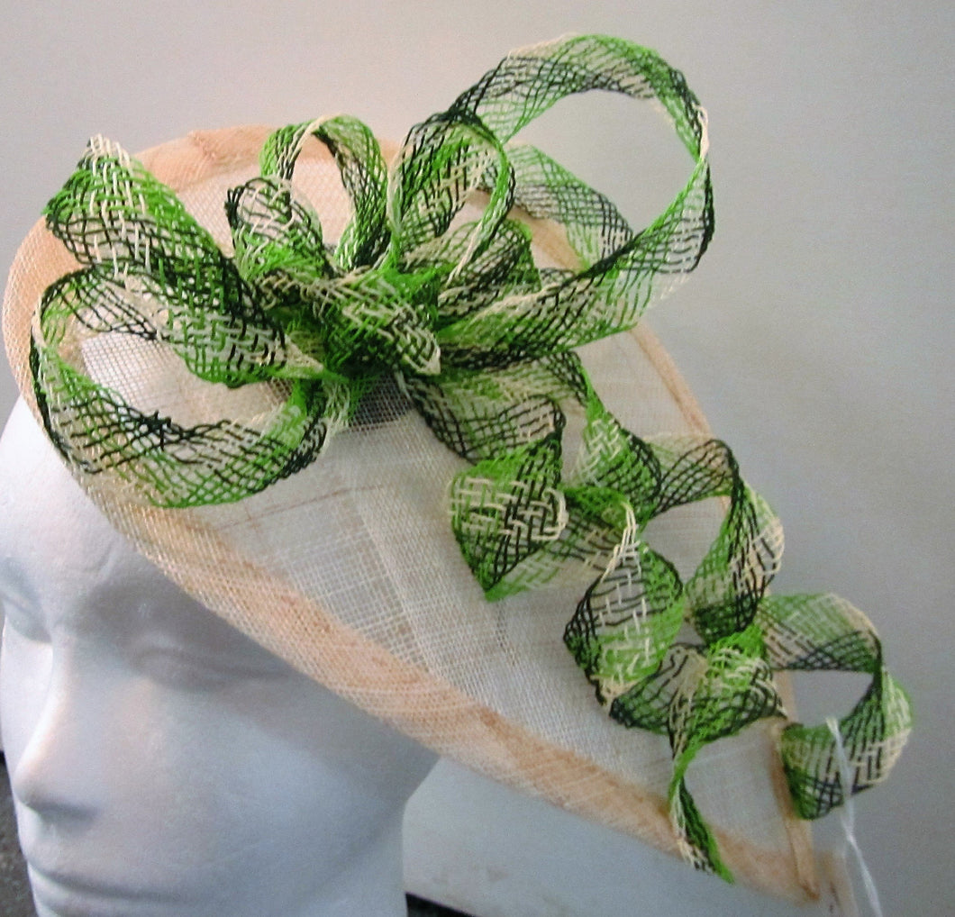 Handcrafted green and cream bows teardrop fascinator on a hair band