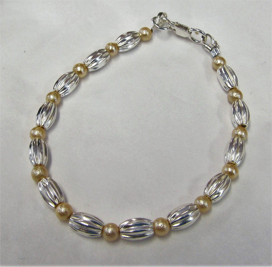 Handcrafted bracelet with swarovski pearls sterling silver beads