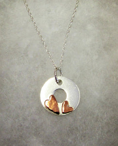 Handcrafted 925 sterling silver disk with hammered copper hearts necklace