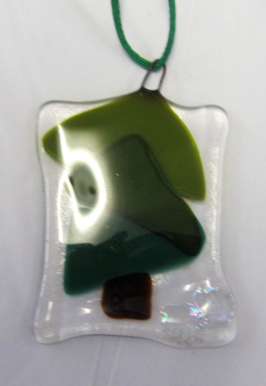 Various beautiful handcrafted fused glass tree decorations