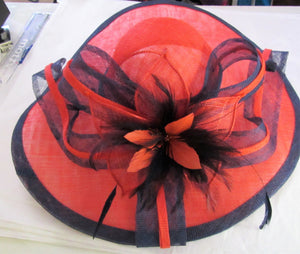 Handcrafted hatinator with bow feathers on a hair band various colours