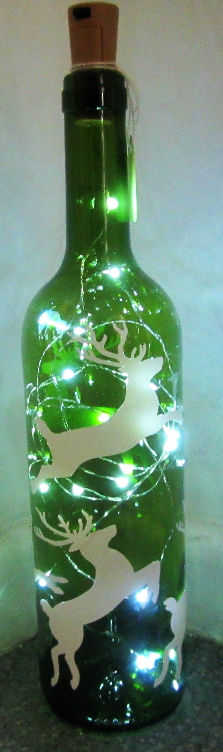 Unique handcrafted Stag light up green bottle