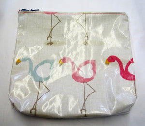 Handcrafted waxed flamingo makeup bag with zipped top.
