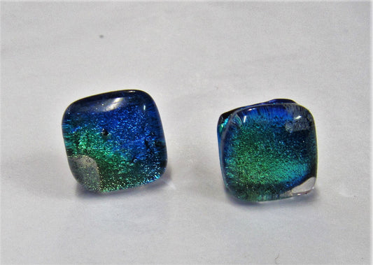 Handcrafted dichroic glass earrings on a sterling silver posts with butterflies