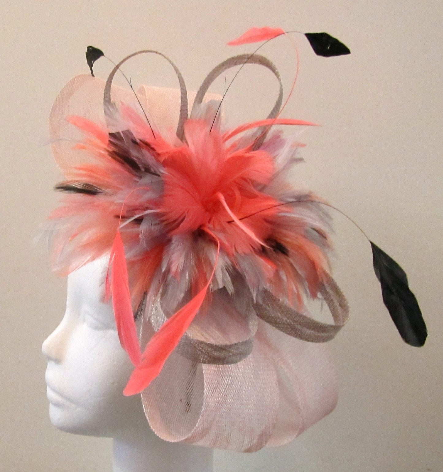 Handcrafted blue bow fascinator with feathers on a hair band various colours