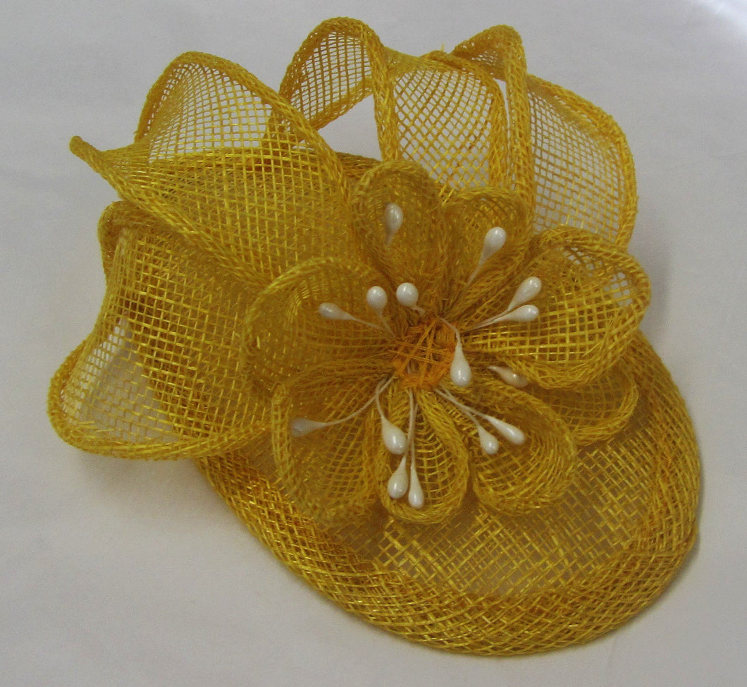 Handcrafted yellow flower fascinator on a hair band or hair clip