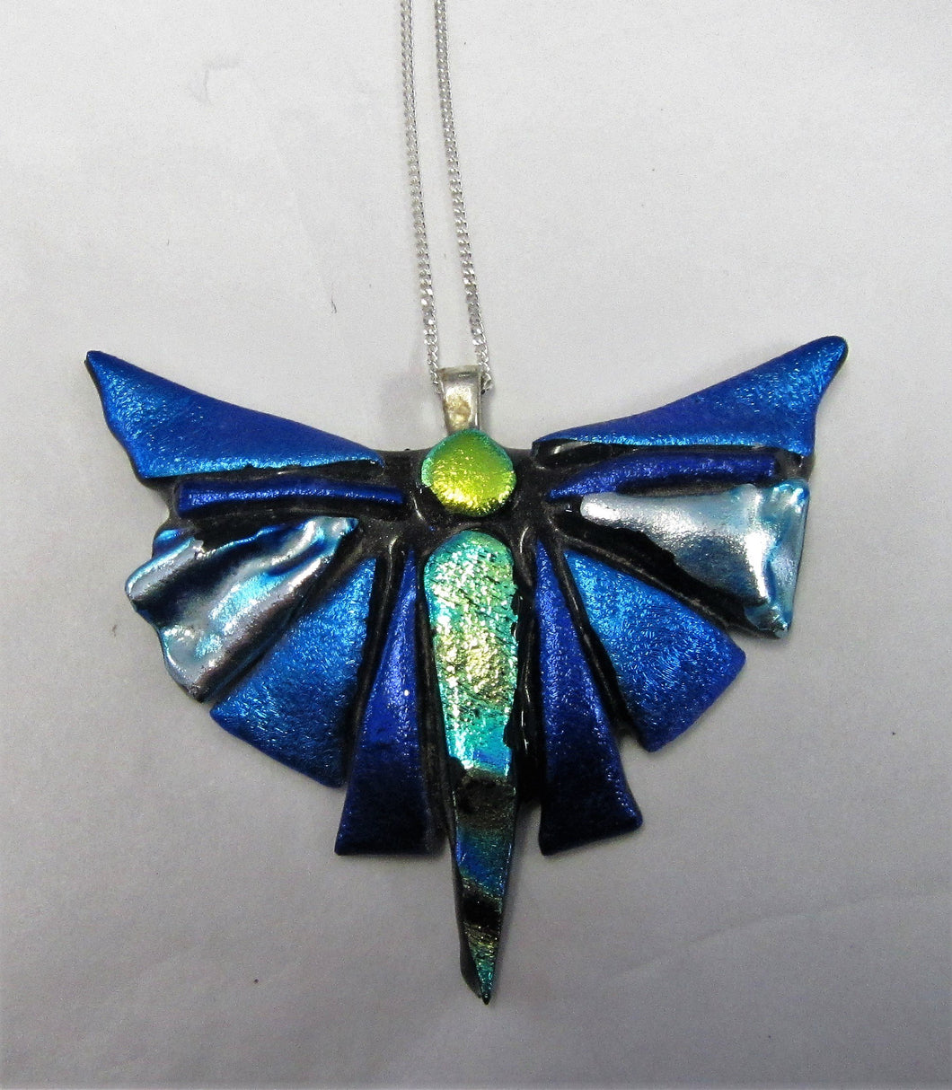 Handcrafted dichroic glass butterfly on a sterling silver necklace