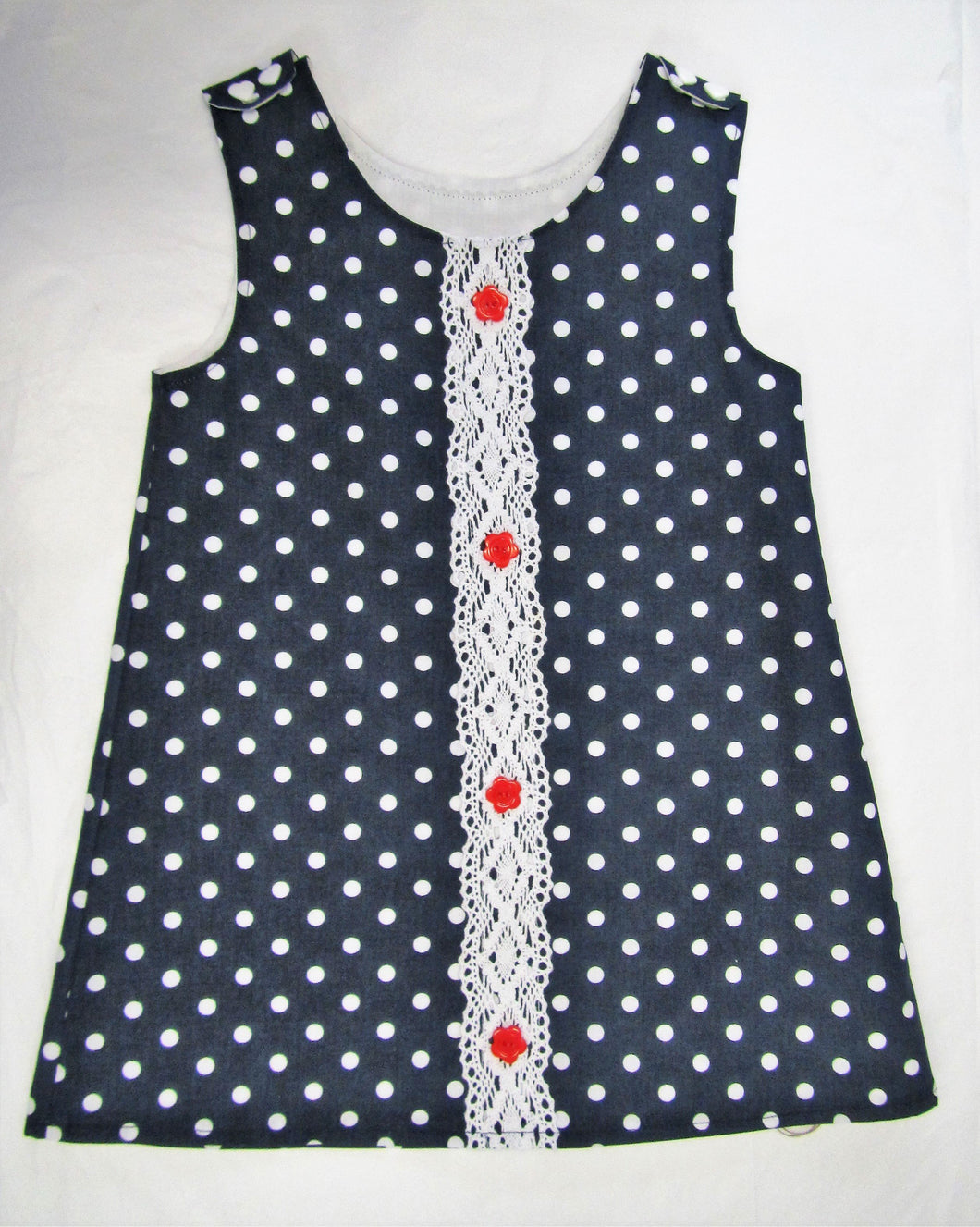 Handcrafted navy polka dot lace pinafore 18-24 months