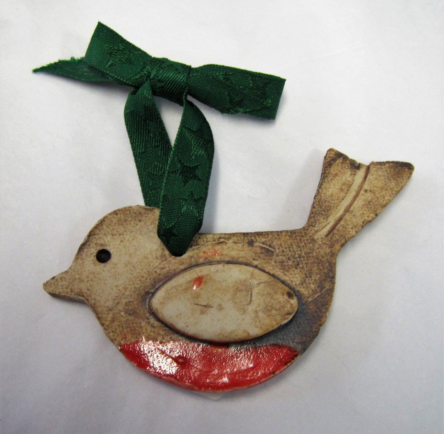 Various beautiful handcrafted ceramic Robin Christmas tree decorations