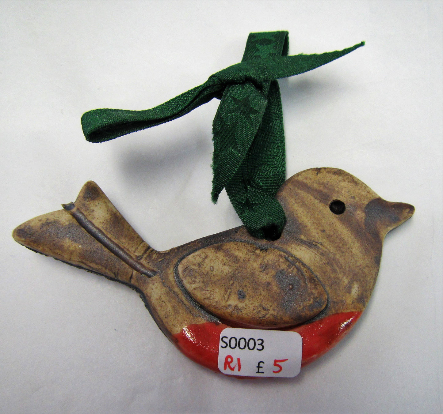 Various beautiful handcrafted ceramic Robin Christmas tree decorations